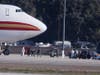 Passengers board buses Wednesday after arriving on an airplane carrying U.S. citizens being evacuated from Wuhan, China, at March Air Reserve Base in Riverside, California. 