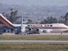 An airplane carrying U.S. citizens being evacuated from Wuhan, China, lands Wednesday at March Air Reserve Base in Riverside, California. 