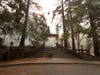 The main building and restaurant at Meadowood Napa Valley luxury resort burns after the Glass Incident Fire moved through the area Sunday in St. Helena, California.