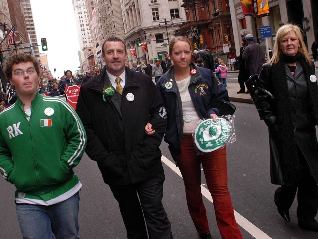 From left: Sean McAllister, Malachy McAllister, Nicola McAllister, and Bernadette McAllister march in the 53rd Annual St. Patrick's Day Parade on March 14, 2004 in Philadelphia, Pennsylvania.