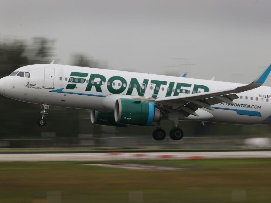 Frontier Airlines announced Wednesday it will be pulling out of Newark Liberty International Airport. Above, a plane lands at the Miami International Airport on June 16, 2021.