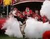 In this 2011 photo, Schiano leads Rutgers football onto the field as their head coach. Taken at High Point Solutions Stadium in Piscataway
