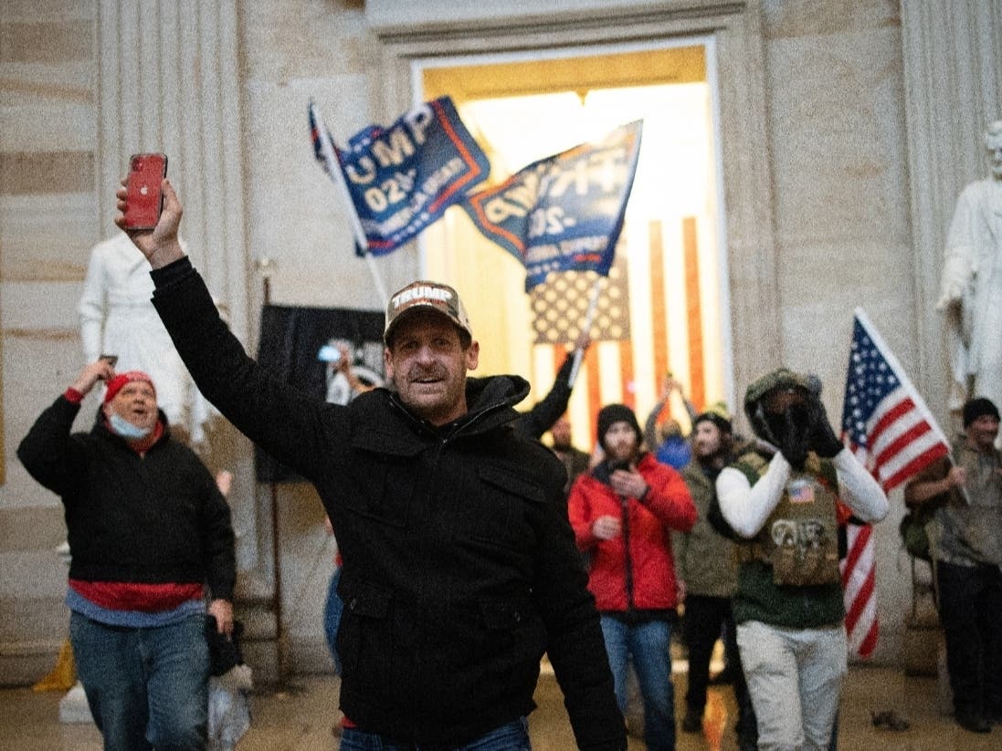 A pro-Trump mob enters the Roturnda of the U.S. Capitol Building on January 06, 2021 in Washington, DC. Congress held a joint session today to ratify President-elect Joe Biden's 306-232 Electoral College win over President Donald Trump. 