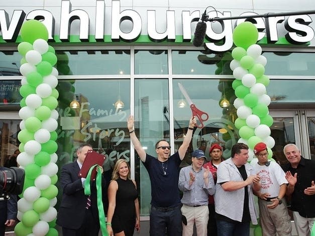 Donnie Wahlberg helps open a Wahlburgers on the east coast in 2015.