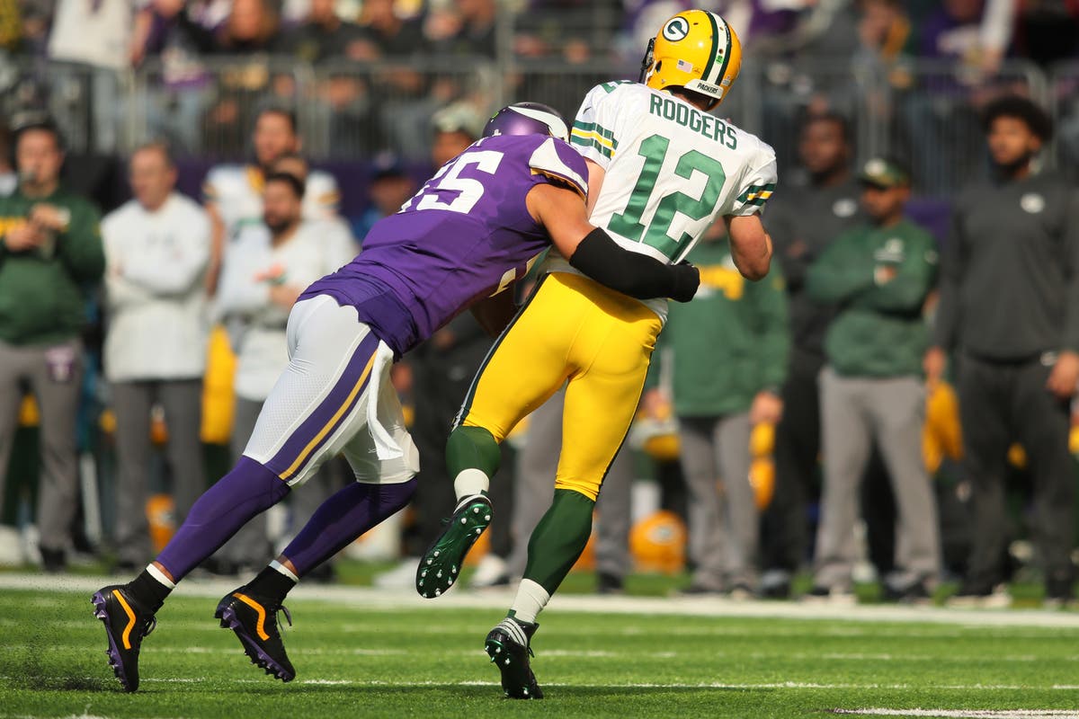 ​ Anthony Barr hits Aaron Rodgers during the first quarter of the game on October 15, 2017 at US Bank Stadium.