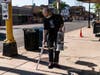eff Neppl cleans up glass from a window shot out at the Uptown Theater overnight on June 21, 2020 in Minneapolis, Minnesota. 