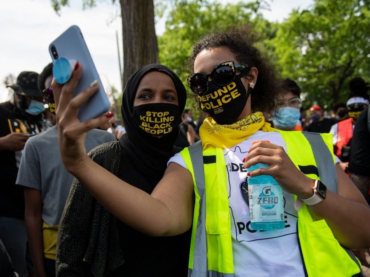 Rep. Ilhan Omar (D-MN) poses for a picture before a march to calling for the city to defund the Minneapolis Police Department on June 6, 2020 in Minneapolis, Minnesota.
