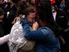 Katie Wright (L), the mother of Daunte Wright, is embraced during a vigil for her son on April 12, 2021 in Brooklyn Center, Minnesota. 