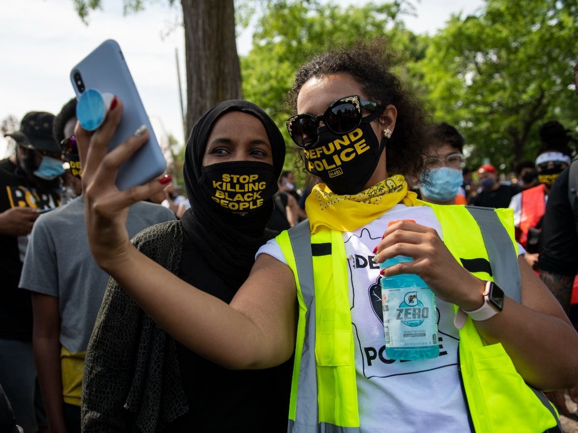 Rep. Ilhan Omar (D-MN) poses for a picture before a march to calling for the city to defund the Minneapolis Police Department on June 6, 2020 in Minneapolis, Minnesota. 