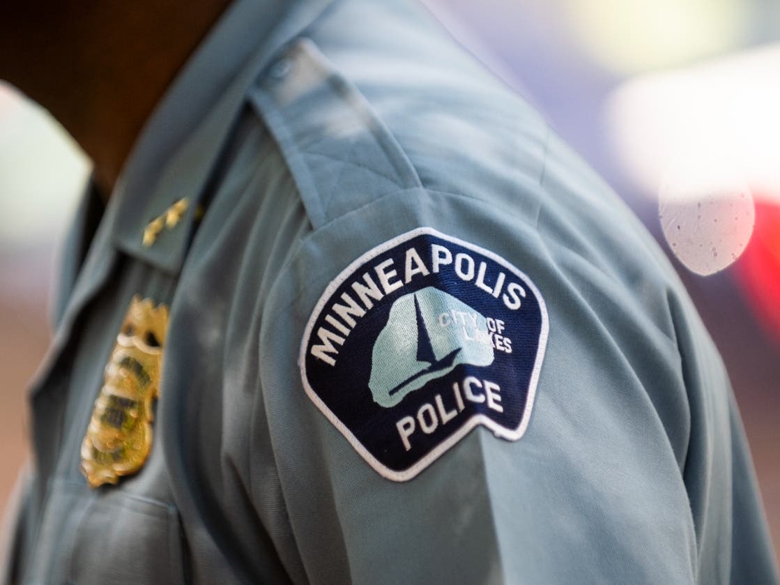 Minneapolis Police Deputy Chief Art Knight speaks with people gathered near a crime scene on June 16, 2020, in Minneapolis, Minnesota.