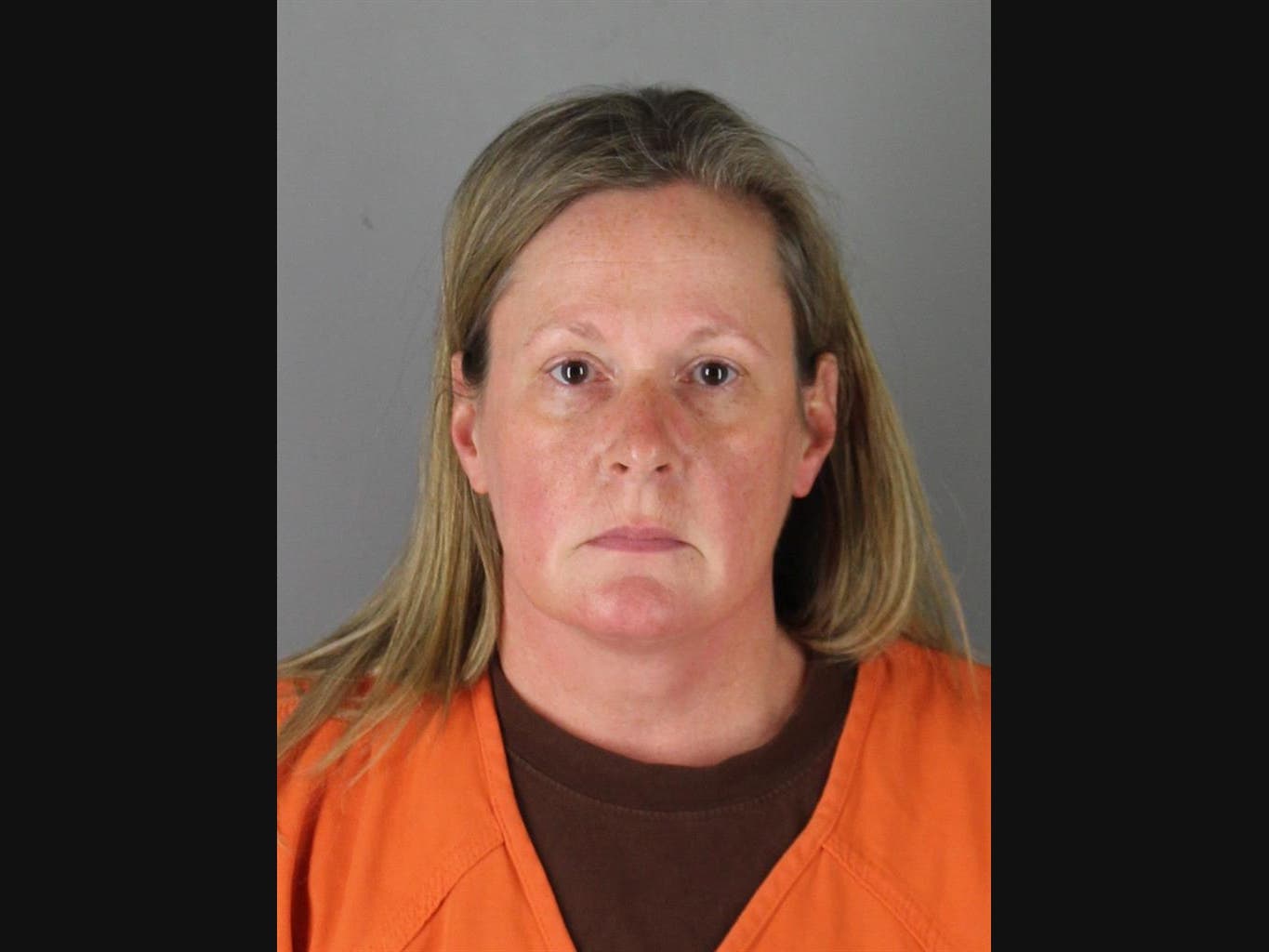  In this handout provided by the Hennepin County Sheriff's Office, former Brooklyn Center Police Officer Kim Potter poses for a mugshot at the Hennepin County Jail on April 14, 2021 in Minneapolis, Minnesota.