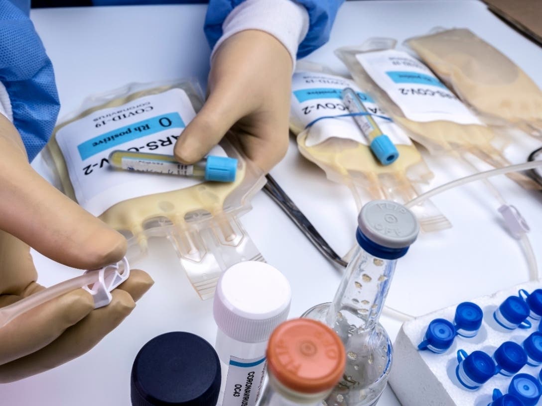 Plasma bag with antibodies from people cured of SARS-COV-2 Covid-19 prepared in a hospital, conceptual image