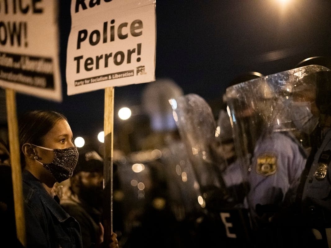 Demonstrators gather in protest near the location where Walter Wallace, Jr. was killed by two police officers on October 27, 2020 in Philadelphia, Pennsylvania.