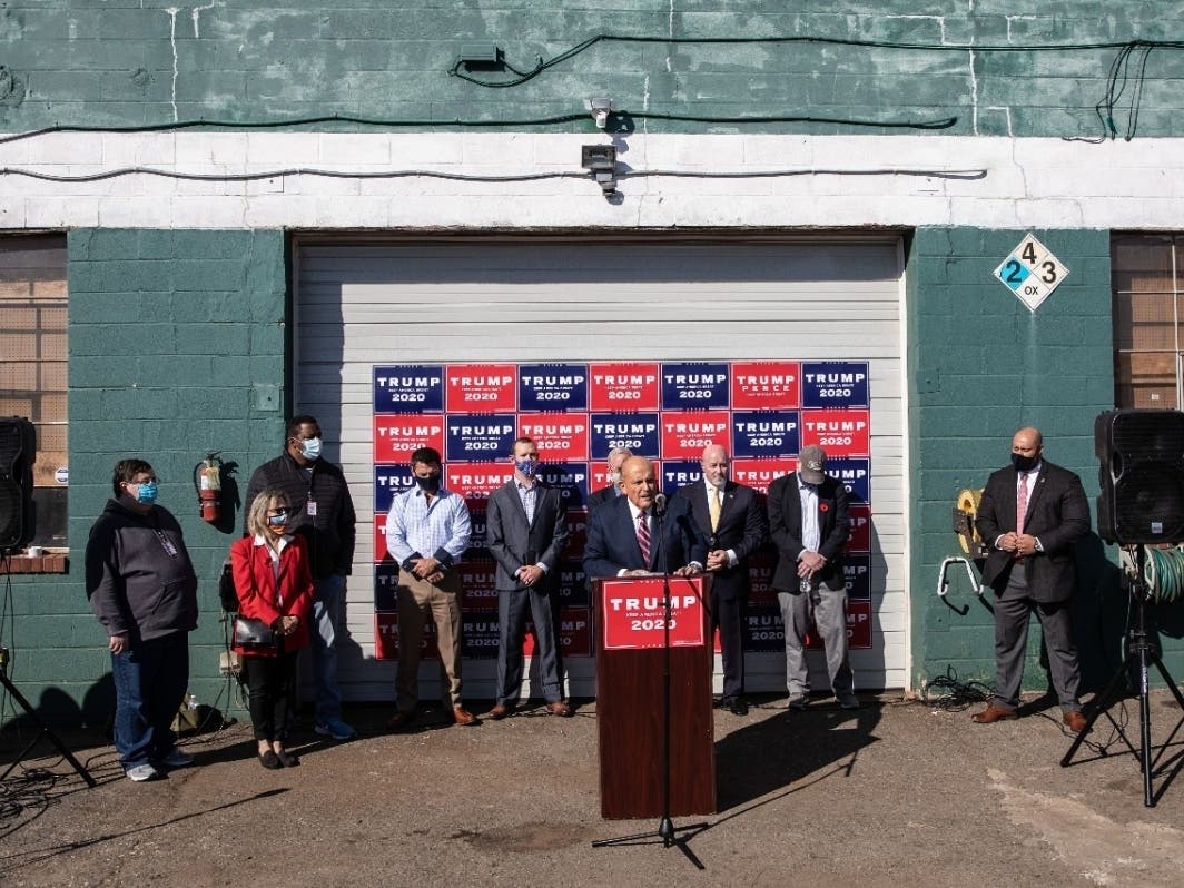  Attorney for the President, Rudy Giuliani speaks to the media at a press conference held in the back parking lot of landscaping company on November 7, 2020 in Philadelphia, Pennsylvania.
