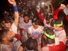 Membersof the Philadelphia Phillies celebrate in the locker room after defeating the San Diego Padres in game five to win the National League Championship Series at Citizens Bank Park on October 23, 2022 in Philadelphia, Pennsylvania.