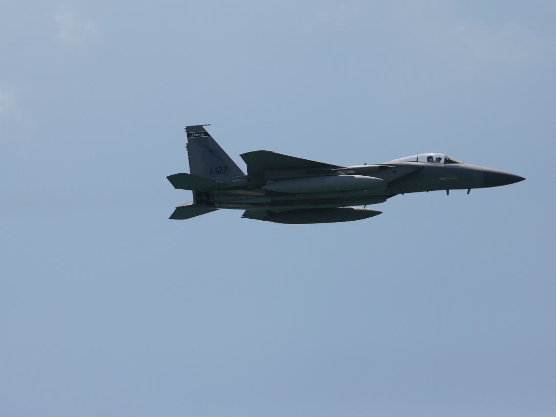 A F-15 jet from the Florida Air National Guard's 125th Fighter Wing practices maneuvers before the Hyundai Air and Sea Show on May 28, 2021 in Miami Beach, Florida.