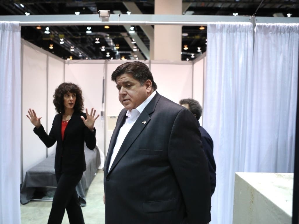  Illinois Gov. J.B. Pritzker on Friday tours what will be a 3,000-bed medical facility at McCormick Place to treat less-seriously-ill COVID-19 patients.