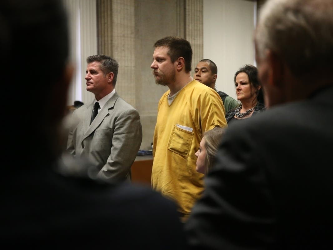 Former Chicago police officer Jason Van Dyke and his attorney Daniel Herbert, at left, attend Van Dyke's sentencing hearing on Jan. 18, 2019 after his October 2018 murder conviction for the on-duty shooting of Laquan McDonald.