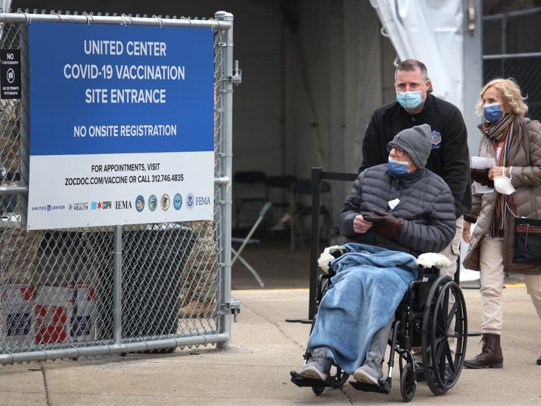 A mass COVID-19 vaccination center in a parking lot outside of the United Center, home to the Chicago Bulls and Blackhawks, began operating this week in Chicago. Up to 6,000 vaccines a day can be administered at the site.