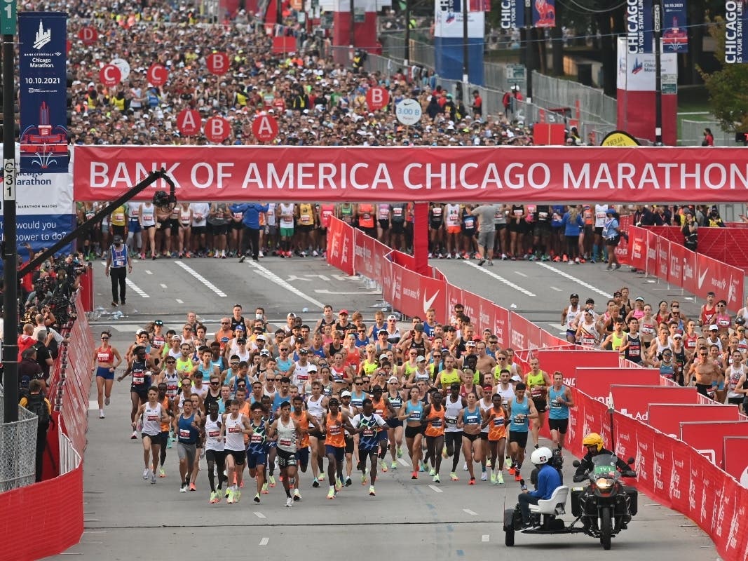 The first wave of runners takes off from the starting line during the 2021 Chicago Marathon on Oct. 10 in Chicago. 