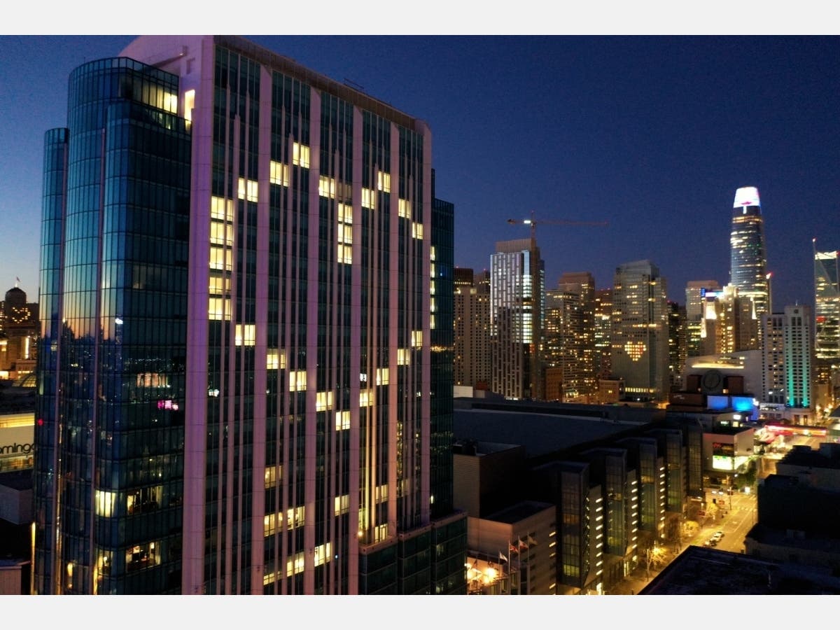 Window lights are illuminated in the shape of a heart at the InterContinental San Francisco Hotel on April 01, 2020 in San Francisco, California. 