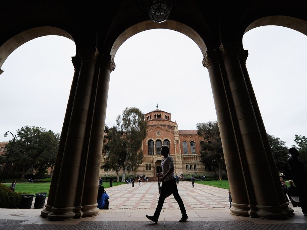 LOS ANGELES, CA - APRIL 23: A student walks near Royce Hall on the campus of UCLA on April 23, 2012 in Los Angeles, California. 