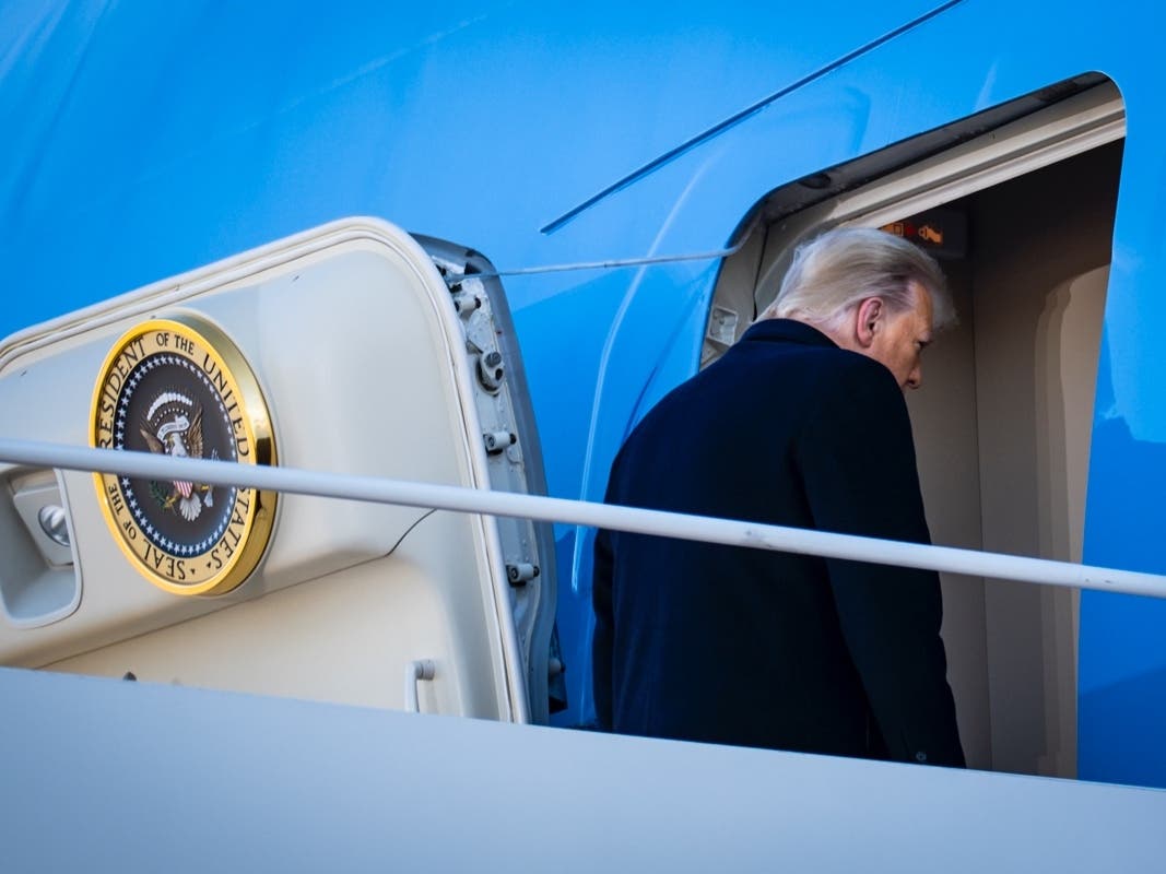 JOINT BASE ANDREWS, MARYLAND - JANUARY 20: President Donald Trump boards Air Force One at Joint Base Andrews before boarding Air Force One for his last time as President on January 20, 2021 in Joint Base Andrews, Maryland.