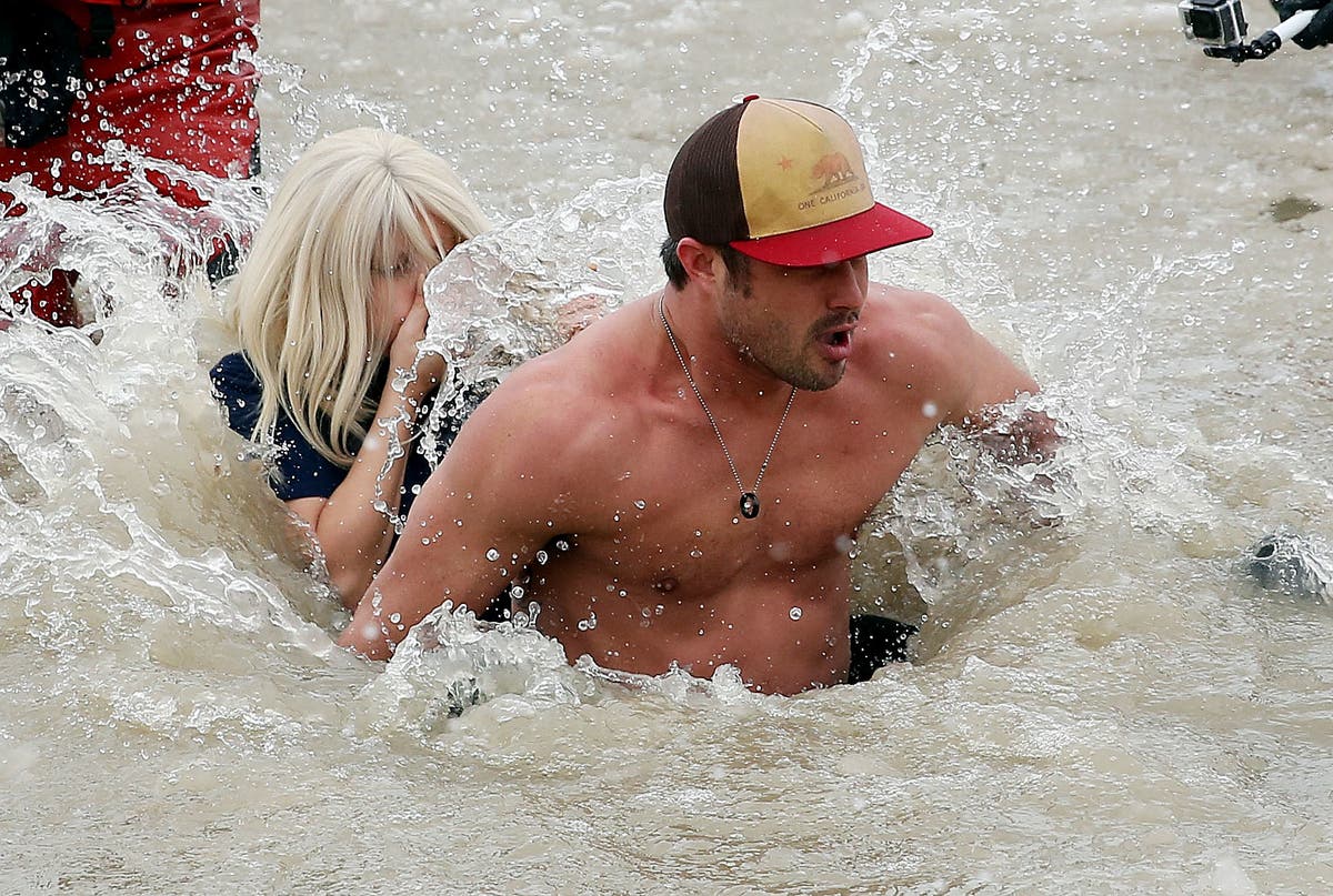 Lady Gaga and Taylor Kinney participate in the Chicago Polar Plunge 2015.