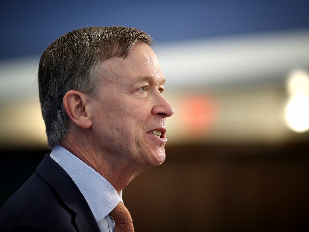 John Hickenlooper speaks at the National Press Club. The former Colorado governor is under fire for a newly-released ethics report.