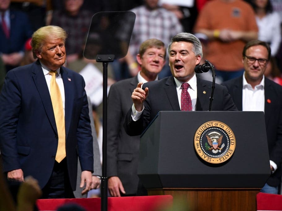 Sen. Cory Gardner (R-CO) speaks with President Donald Trump on stage during a rally Feb. 20 in Colorado Springs. Gardner, a first-term Republican senator, is up for re-election this year. 