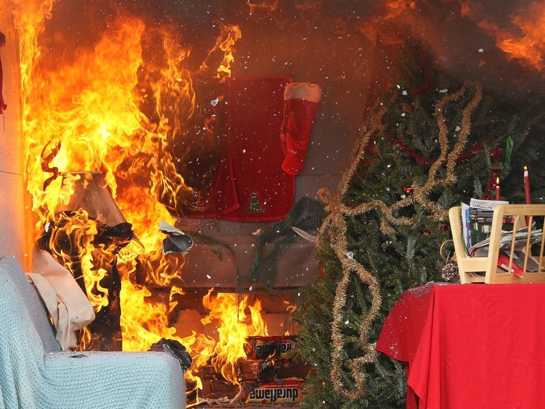  Fire from a fireplace consumes a room during a holiday safety live fire demonstration in California. Demonstrations using live fire showed how quickly fires can consume a home.