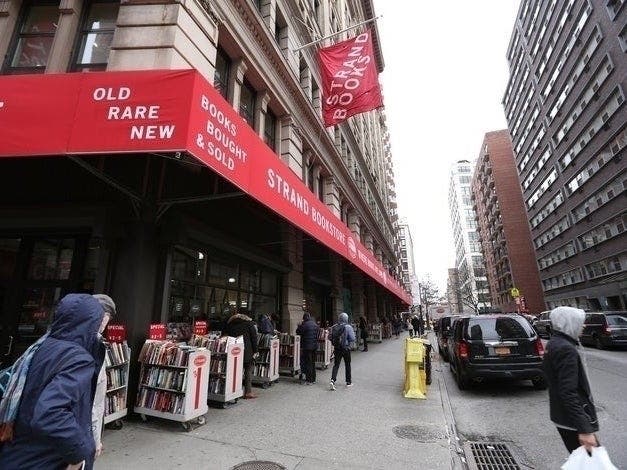 The iconic bookstore laid off the majority of its staff amid coronavirus closures, but is asking the governor to continue online orders.