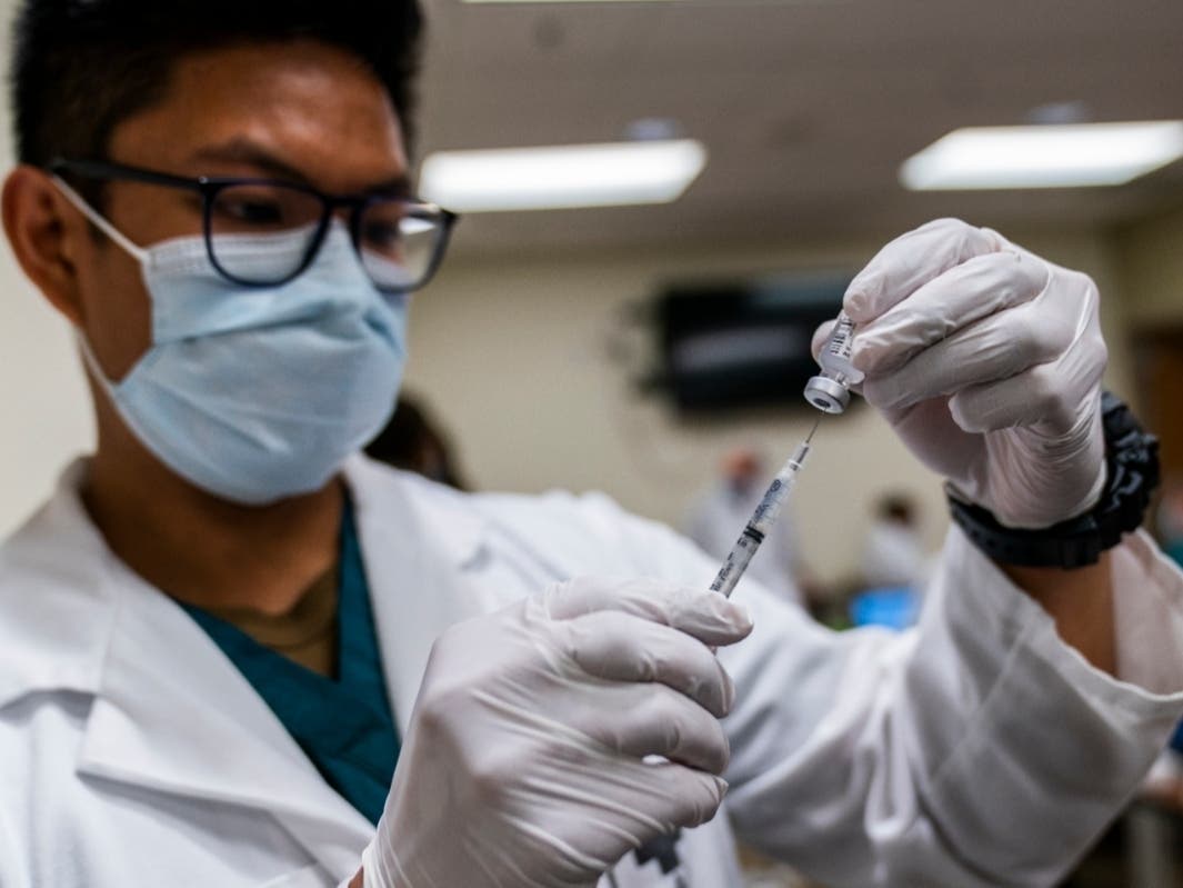 HN Milan Torres prepares a dose of the COVID-19 vaccine in Maryland. Some Morristown Medical Center employees will receive the coronavirus vaccine from Pfizer/BioNTech on Tuesday afternoon.