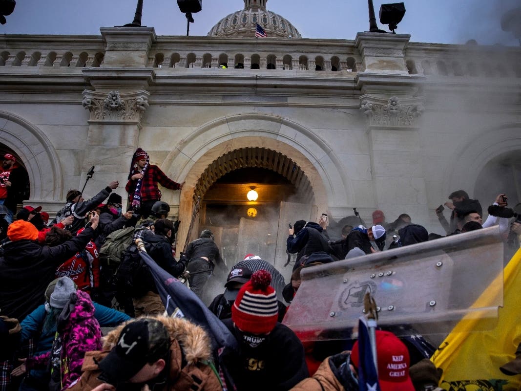 Rioters storm the Capitol on Jan. 6 as Congress tries to certify results of the 2020 presidential election.