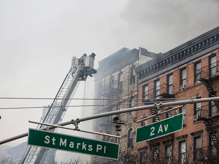 The Fire Department puts out a fire after an explosion at Second Avenue and St. Marks Place March 26, 2015.
