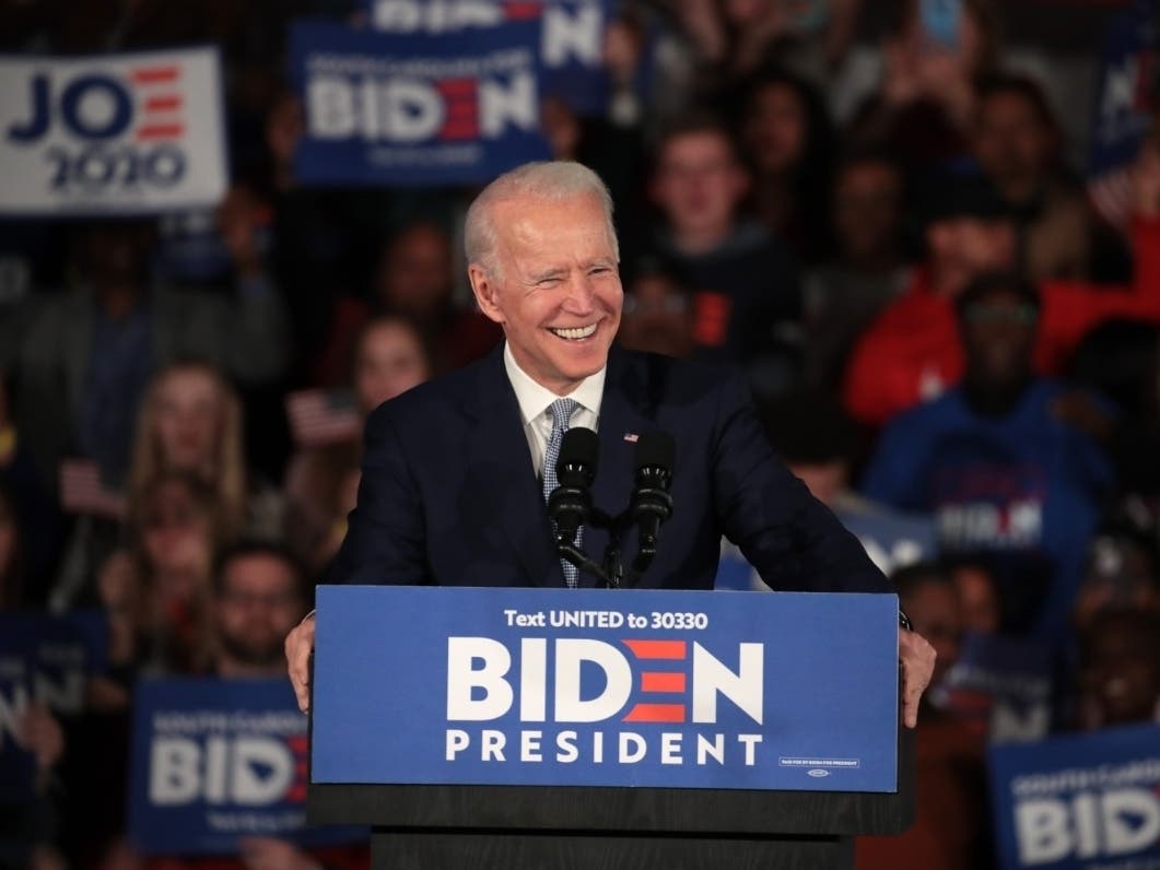 Georgia's hand tally of the election began Friday, but news networks projected mid-afternoon that Joe Biden wins the state's electoral votes.