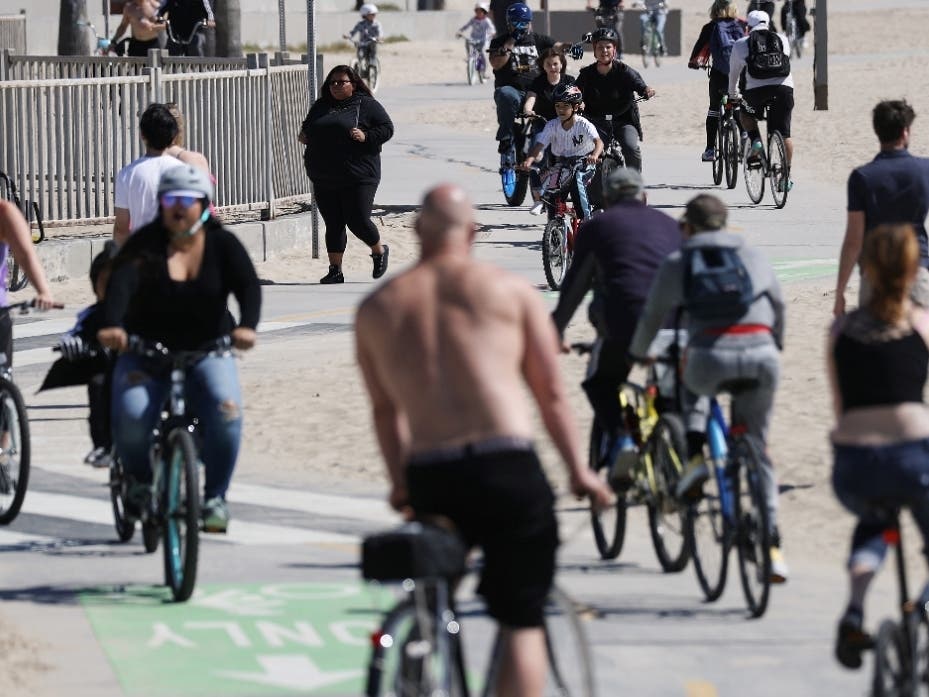 LA County's beach bike path extending from Pacific Palisades to Torrance reopens for the first time since the shut down began.