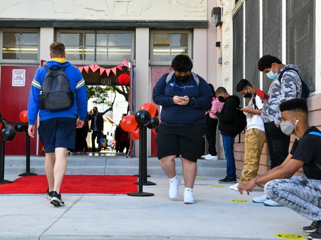 File Photo: Students observe social distance protocols as they return to in-person learning at Hollywood High School in 2021 in Los Angeles.