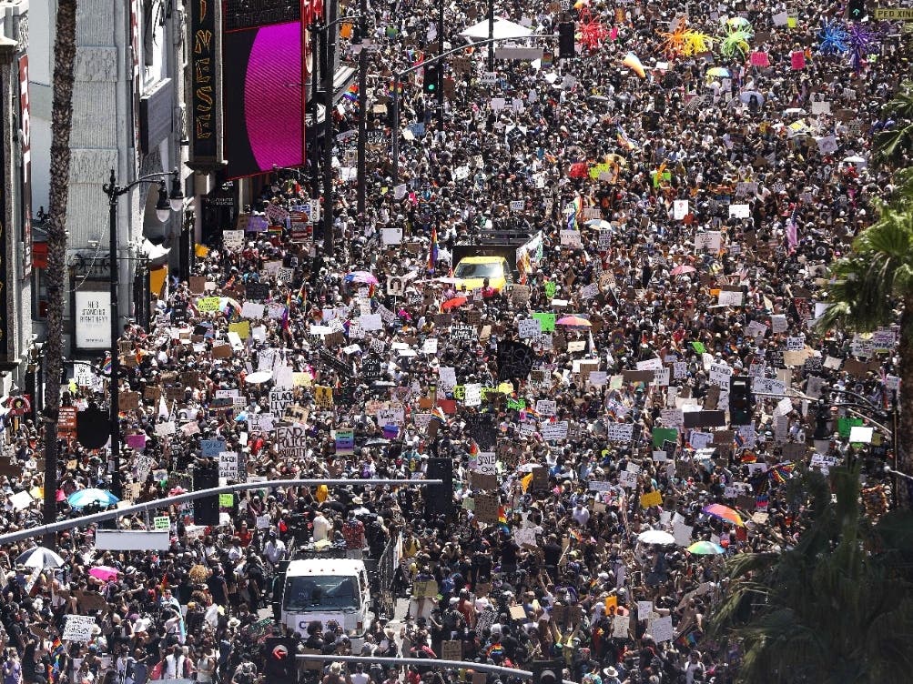 Protesters gather on Hollywood Boulevard near the famous TCL Chinese Theatre during the All Black Lives Matter solidarity march as protests continue in the wake of George Floyd’s death on June 14, 2020.