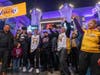People cheer for former NBA star Kobe Bryant, who was killed in a helicopter crash in Calabasas, California, as they mourn near Staples Center on January 26, 2020 in Los Angeles, California. 