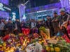  People mourn for former NBA star Kobe Bryant, who was killed in a helicopter crash in Calabasas, California, near Staples Center on January 26, 2020 in Los Angeles, California.