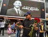 A fan mourns the death of retired NBA star Kobe Bryant outside the Staples Center prior to the 62nd Annual Grammy Awards on January 26, 2020 in Los Angeles, California. 