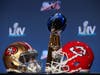 The Vince Lombardi Trophy is displayed with helmets of the San Francisco 49ers and Kansas City Chiefs prior to a press conference with NFL Commissioner Roger Goodell for Super Bowl LIV at the Hilton Miami Downtown on January 29, 2020 in Miami, Florida.
