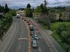 Cars line up to get a COVID-19 test at a free public testing station on March 24, 2020 in Hayward, California.