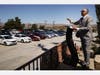 Pastor Jerel Hagerman conducts a drive-in ‘car church’ Easter service in the parking lot of Joshua Springs Calvary Chapel amidst the coronavirus pandemic on April 12, 2020 in Yucca Valley, California.