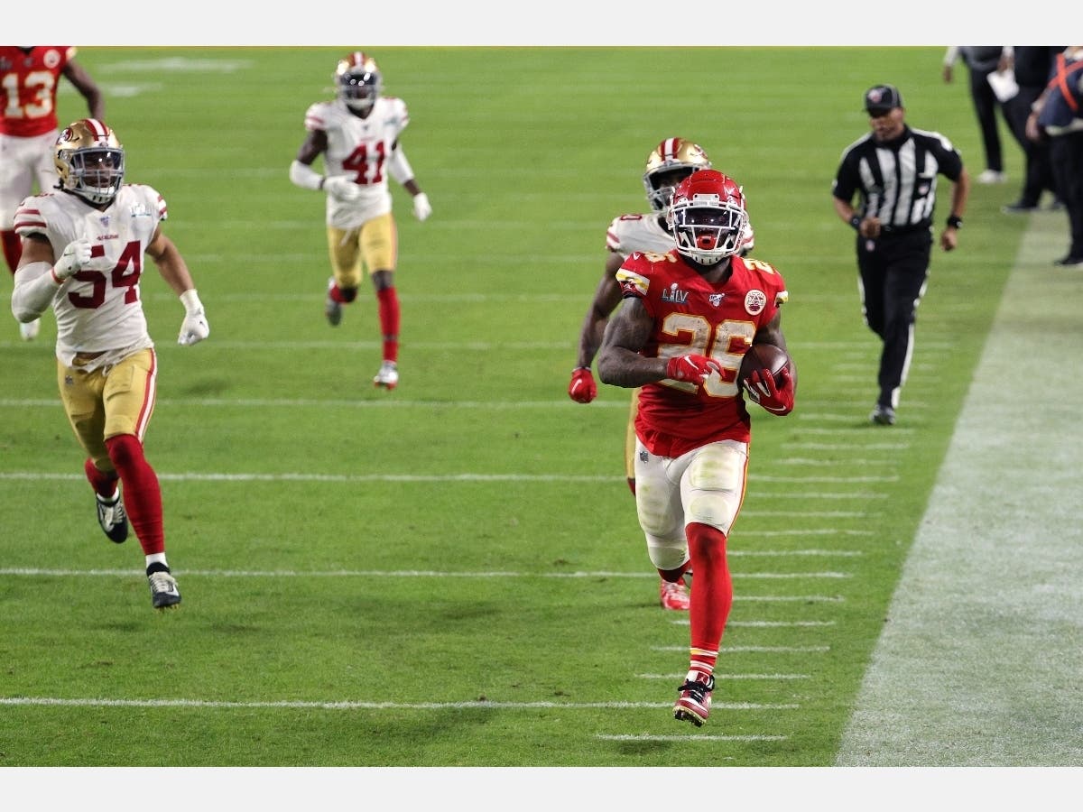 Damien Williams #26 of the Kansas City Chiefs runs for a touchdown against the San Francisco 49ers during the fourth quarter in Super Bowl LIV at Hard Rock Stadium on February 02, 2020 in Miami, Florida.