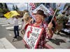 Demonstrators protest during a "Freedom Rally" against Stay-At-Home Directives on April 18, 2020 in San Diego, California. 