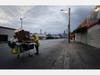 Mal, who is originally from Texas and currently homeless, pauses as he pushes a cart with his belongings on a downtown street amidst the coronavirus pandemic on April 18, 2020 in Los Angeles, California.