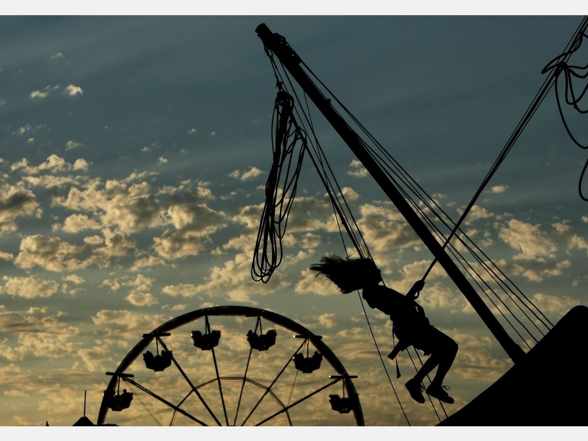 A young girl plays on a bungee trampoline at the Sonoma-Marin Fair June 20, 2008 in Petaluma, California