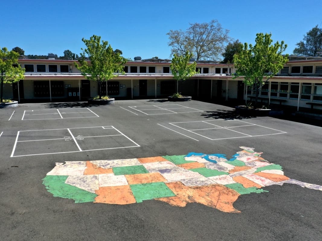 A map of the United States is painted on the playground at Kent Middle School on April 01, 2020 in Kentfield, California.